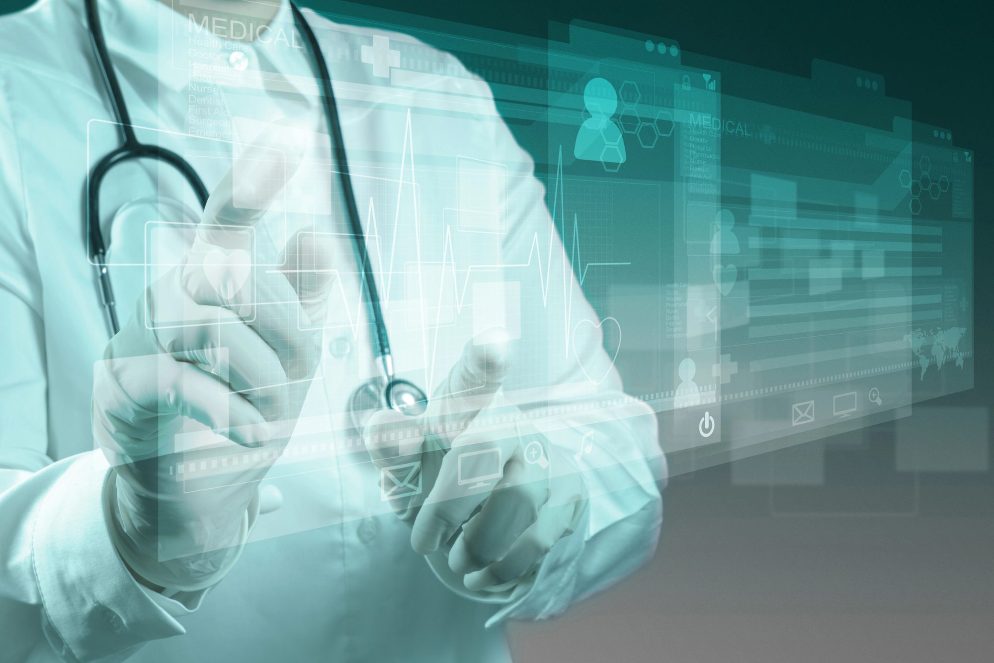 Image of a physician wearing a stethoscope and pointing to superimposed healthcare data symbols